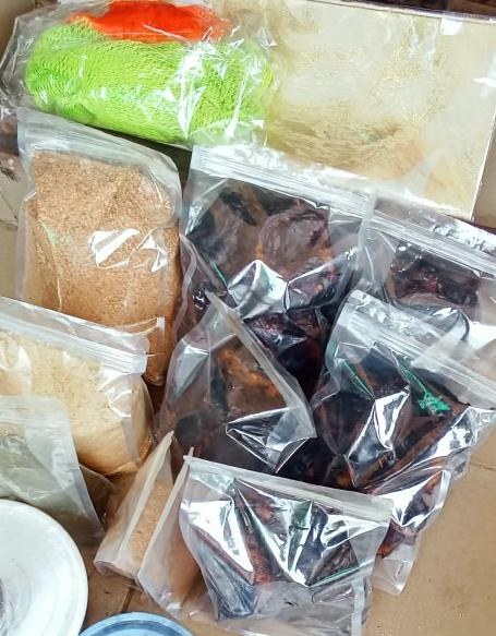 Sealed bags of dried fish, crayfish and garri packed for shipping